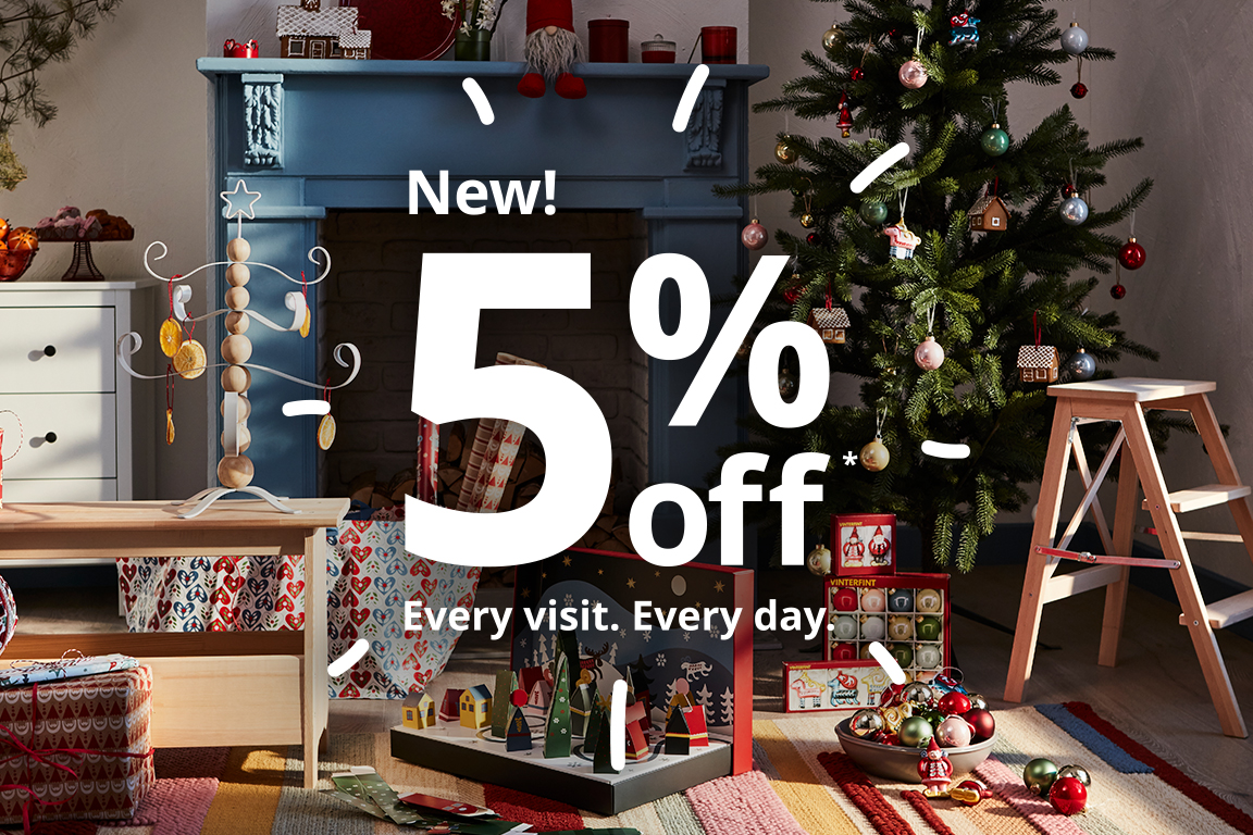 A living room decorated for the holidays. New! IKEA Family members save 5%. Every visit. Every day.